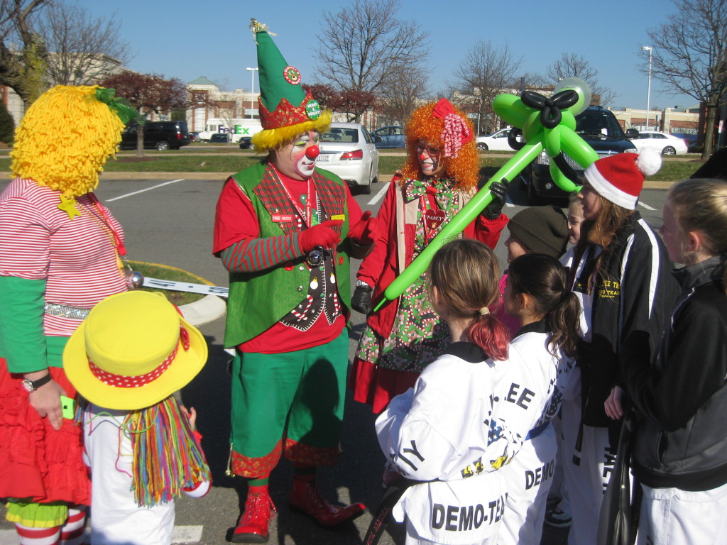 JCA Members entertaining parade participants before a parade at the Reston Town Center